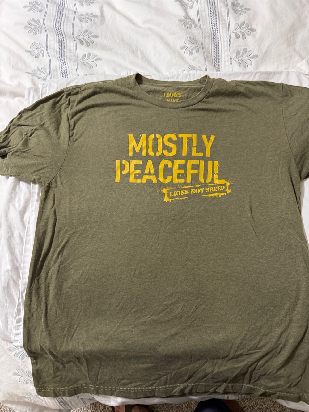 Mostly Peaceful Men’s Olive Green Graphic Tee by Lions Not Sheep